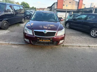 Gebraucht Skoda Octavia Family 105 PS (77 kW) 2012 Rot Limousine