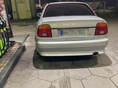 Second-hand Suzuki Baleno 110 CP (80 kW) 1998 Argintiu Berlinǎ