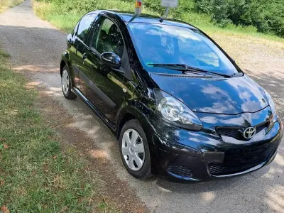 Gebraucht Toyota Aygo Cool 68 PS (50 kW) 2011 Schwarz Kleinwagen