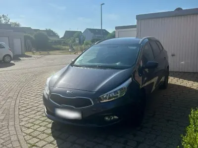 Gebraucht Kia Ceed Sportswagon 128 PS (94 kW) 2014 Grau Kombi