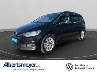 Begagnad VW Touran Highline 150 HK (110 kW) 2017 Svart Minibuss