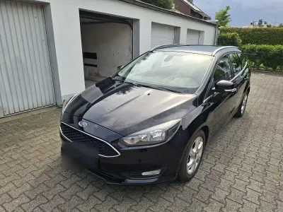 Używany Ford Focus Trend 125 KM (91 kW) 2015 Czarny Kombi