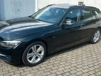 Gebraucht BMW 320 Sport Line 184 PS (135 kW) 2014 Schwarz Kombi