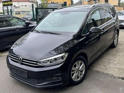 Second-hand VW Touran Highline 150 CP (110 kW) 2021 Negru Monovolum