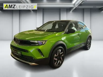 Gebraucht Opel Mokka Elegance 136 PS (100 kW) 2023 Lackierung matcha green/typ aussenverkle (metallic) SUV