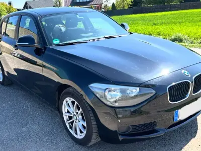 Gebraucht BMW 116 116 PS (85 kW) 2012 Schwarz Kleinwagen