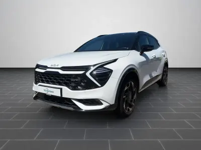 Gebraucht Kia Sportage 265 PS (194 kW) 2023 (ha2) deluxeweiss met./schwarz SUV