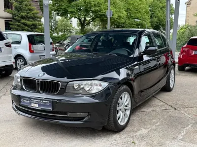 Gebraucht BMW 116 122 PS (89 kW) 2010 Schwarz Kleinwagen
