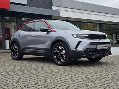 Gebraucht Opel Mokka-e GS Line 100 kW (136 PS) 2021 Kontrast grau/dach schwarz SUV