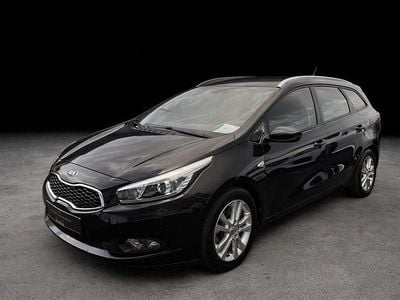 Second-hand Kia Ceed Sportswagon 135 CP (99 kW) 2014 Negru Break