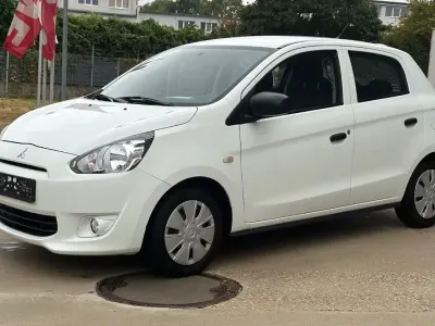 Gebraucht Mitsubishi Space Star Basis 71 PS (52 kW) 2015 Weiß Kleinwagen