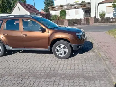 Gebraucht Dacia Duster Lauréate 105 PS (77 kW) 2013 Braun SUV