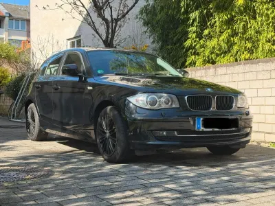 Używany BMW 116 122 KM (89 kW) 2010 Czarny Hatchback
