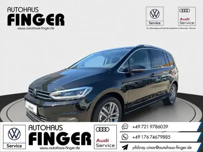 Neu VW Touran Highline 150 PS (110 kW) 2026 Dolphin grau met. Van / Kleinbus
