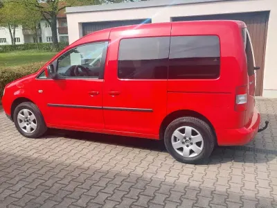 Używany VW Caddy 105 KM (77 kW) 2009 Czerwony Minivan