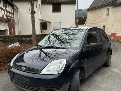 Second-hand Ford Fiesta 60 CP (44 kW) 2003 Negru Hatchback
