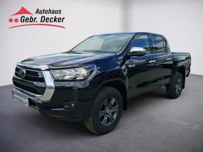 Gebraucht Toyota HiLux Basis 150 PS (110 kW) 2024 Tiefschwarz mica metallic Pickup