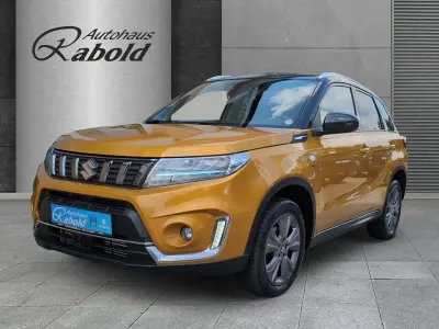 Gebraucht Suzuki Vitara Comfort 140 PS (102 kW) 2022 Solar yellow / cosmic black (gelb) SUV