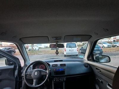 Second-hand Suzuki Swift 92 CP (67 kW) 2009 Gri Hatchback