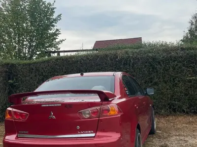 Gebraucht Mitsubishi Lancer 143 PS (105 kW) 2008 Rot Limousine