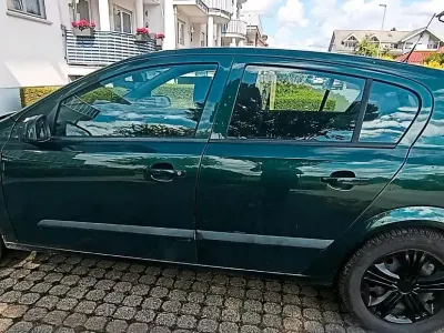 Gebraucht Opel Astra 105 PS (77 kW) 2005 Grün Kombi