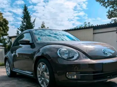 Gebraucht VW Beetle 105 PS (77 kW) 2012 Braun Kleinwagen
