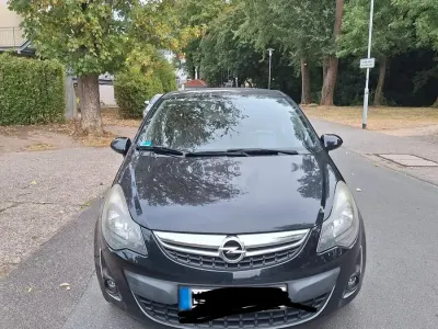Gebraucht Opel Corsa 68 PS (50 kW) 2014 Schwarz Kleinwagen
