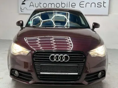 Używany Audi A1 Attraction 122 KM (89 kW) 2011 Purpurowy Hatchback