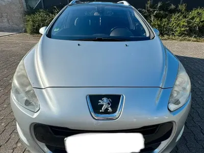 Gebraucht Peugeot 308 SW 120 PS (88 kW) 2011 Grau Kombi