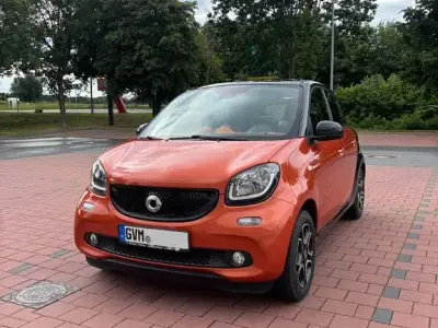 Gebraucht Smart ForFour Passion 71 PS (52 kW) 2015 Orange Kleinwagen
