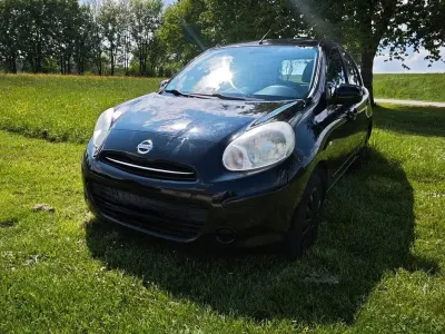 Occasion Nissan Micra Tekna 80 PK (58 kW) 2011 Zwart Hatchback