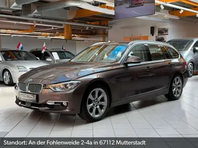 Gebraucht BMW 330 Sport Line 258 PS (189 kW) 2014 Braun Kombi