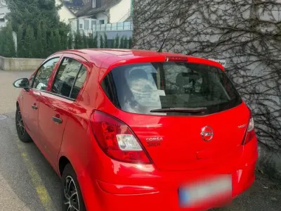 Gebraucht Opel Corsa 70 PS (51 kW) 2012 Rot Kleinwagen
