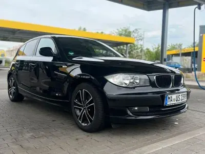 Gebraucht BMW 116 122 PS (89 kW) 2010 Schwarz Kleinwagen