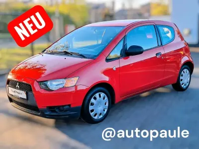 Begagnad Mitsubishi Colt Inform 95 HK (69 kW) 2009 Röd Halvkombi