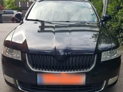 Używany Skoda Superb Elegance 170 KM (125 kW) 2010 Czarny Kombi