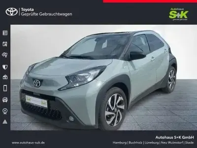 Gebraucht Toyota Aygo X Basis 72 PS (52 kW) 2025 Urban khaki (6x3)/ black mica SUV