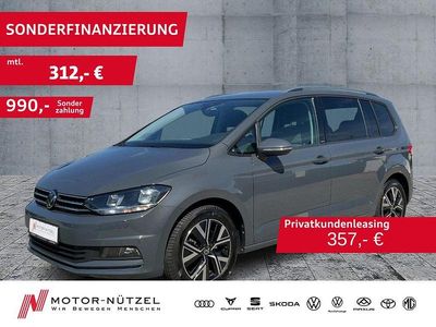 Delfingrau metallic Gebraucht 2024 VW Touran Move Van / Kleinbus | 31.940 € (Guter Preis)
