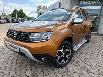 Używany Dacia Duster Anniversary 131 KM (96 kW) 2021 Pomarańczowy SUV