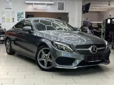 Gebraucht Mercedes C200 AMG line 184 PS (135 kW) 2017 Selenitgrau  metalliclack Coupé