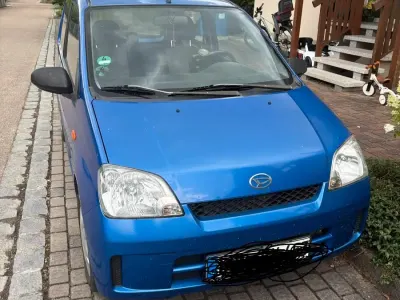 Gebraucht Daihatsu Cuore 58 PS (42 kW) 2004 Blau Kleinwagen