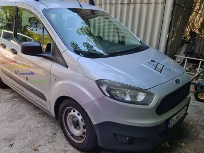 Gebraucht Ford Tourneo Courier Trend 75 PS (55 kW) 2016 Silber Van / Kleinbus