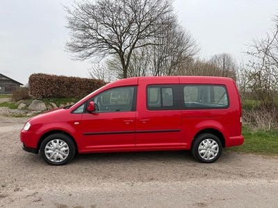 Second-hand VW Caddy Maxi 105 CP (77 kW) 2009 Roșu Monovolum