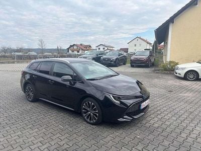 Gebraucht Toyota Corolla Hybrid Team 122 PS (89 kW) 2023 Black mica / ink Kombi