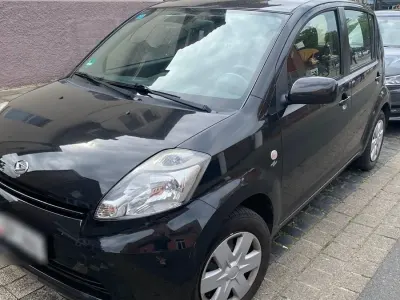 Gebraucht Daihatsu Sirion 71 PS (52 kW) 2007 Schwarz Kleinwagen