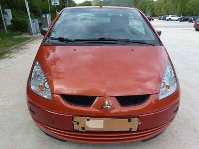 Begagnad Mitsubishi Colt Inform 109 HK (80 kW) 2006 Orange Cab
