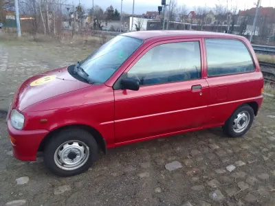 Gebraucht Daihatsu Cuore 43 PS (31 kW) 1998 Rot Kleinwagen