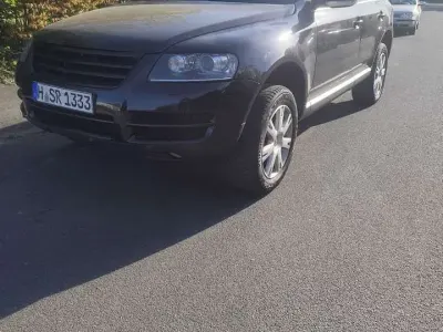 Second-hand VW Touareg R 174 CP (127 kW) 2005 Negru SUV