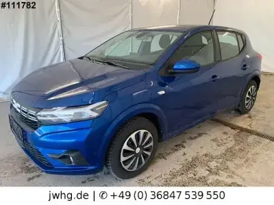 Używany Dacia Sandero Expression 91 KM (66 kW) 2024 Niebieski Sedan/Limuzyna