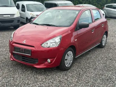 Gebraucht Mitsubishi Space Star Basis 71 PS (52 kW) 2014 Rot Van / Kleinbus